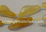 CFG561 15.5 inches 14*28mm carved trumpet flower yellow aventurine beads