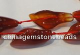 CFG563 15.5 inches 14*28mm carved trumpet flower red agate beads