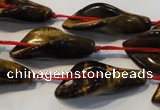 CFG566 15.5 inches 14*28mm carved trumpet flower yellow tiger eye beads