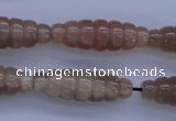 CFG755 15.5 inches 10*30mm carved rice natural moonstone beads