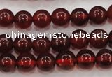 CGA601 15.5 inches 6mm A grade round natural orange garnet beads