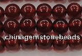 CGA608 15.5 inches 7mm AA grade round natural orange garnet beads