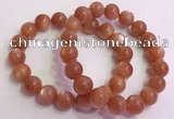 CGB4541 7.5 inches 12mm - 13mm round golden sunstone beaded bracelets