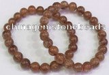 CGB4608 8mm - 9mm round golden rutilated quartz beaded bracelets