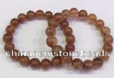 CGB4621 10mm - 11mm round golden rutilated quartz beaded bracelets