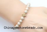 CGB9360 8mm, 10mm white fossil jasper & cross hematite power beads bracelets