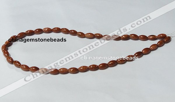 CGS69 15.5 inches 6*10mm rice goldstone beads wholesale