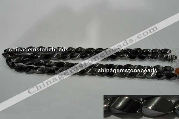 CHE161 15.5 inches 6*12mm twisted rice hematite beads