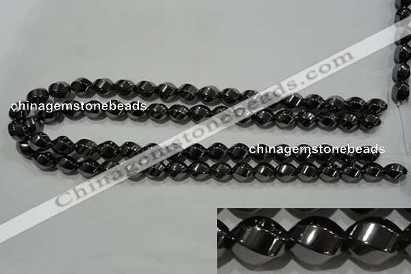 CHE166 15.5 inches 10*12mm twisted rice hematite beads