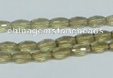 CLQ10 15.5 inches 6*10mm faceted rice natural lemon quartz beads