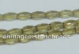 CLQ11 15.5 inches 8*12mm faceted rice natural lemon quartz beads