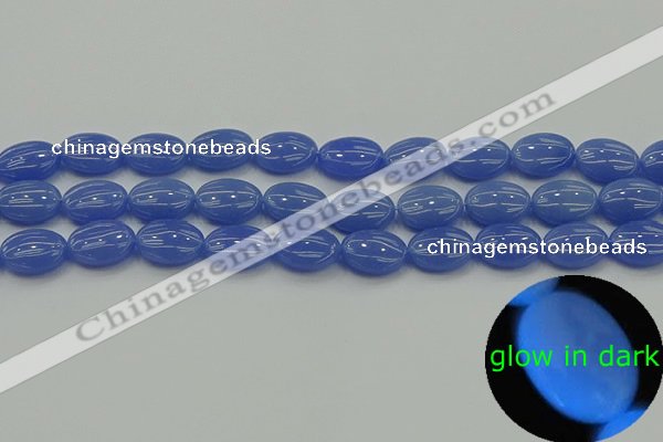 CLU181 15.5 inches 10*14mm oval blue luminous stone beads