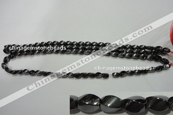 CMH151 15.5 inches 5*8mm twisted rice magnetic hematite beads