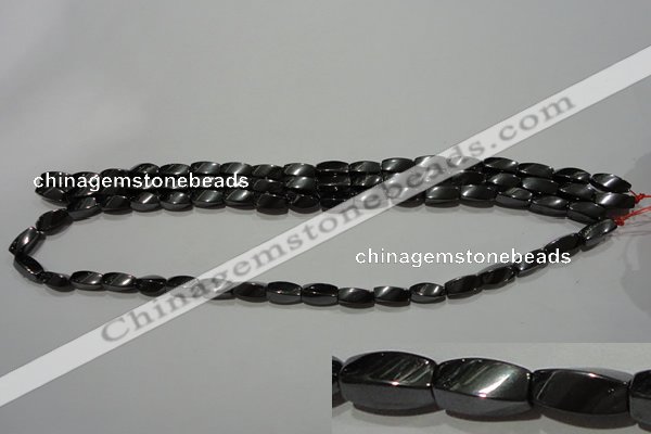 CMH152 15.5 inches 5*11mm twisted rice magnetic hematite beads