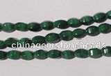 CMN222 15.5 inches 4*6mm faceted rice natural malachite beads