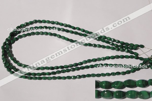 CMN222 15.5 inches 4*6mm faceted rice natural malachite beads