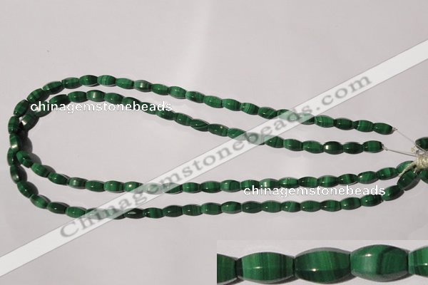 CMN223 15.5 inches 5*9mm faceted rice natural malachite beads