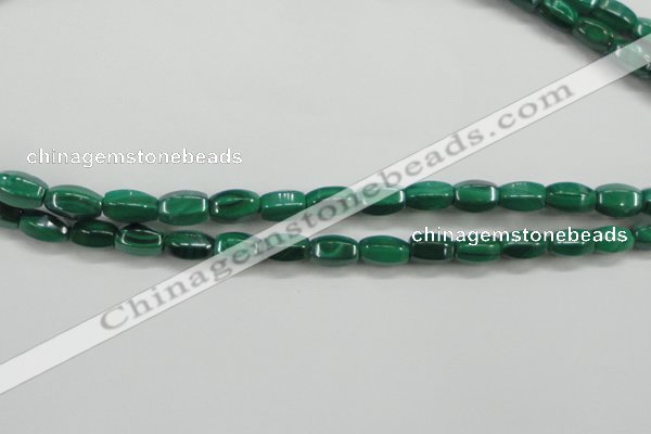 CMN422 15.5 inches 5*8mm faceted rice natural malachite beads