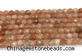 CMS2258 15 inches 6mm faceted round orange moonstone beads