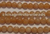 CMS701 15.5 inches 6mm round peach moonstone beads wholesale