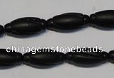 CNE15 15.5 inches 9*20mm carved rice black stone needle beads wholesale