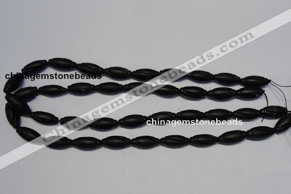 CNE15 15.5 inches 9*20mm carved rice black stone needle beads wholesale