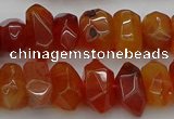 CNG1170 15.5 inches 8*14mm - 10*18mm faceted nuggets carnelian beads