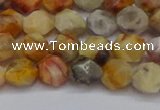 CNG6222 15.5 inches 6mm faceted nuggets yellow crazy lace agate beads