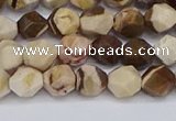 CNG6245 15.5 inches 6mm faceted nuggets zebra jasper beads