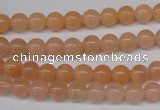 CPE02 15.5 inches 6mm round peach stone beads wholesale