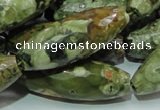 CPS72 15.5 inches 15*40mm faceted rice green peacock stone beads