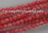 CRC400 15.5 inches 4mm faceted round synthetic rhodochrosite beads