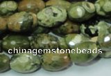 CRH68 15.5 inches 10*15mm faceted rice rhyolite beads wholesale