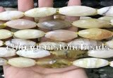 CRI143 15.5 inches 10*30mm faceted rice yellow opal gemstone beads