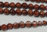 CRO736 15.5 inches 6mm – 14mm faceted round goldstone beads