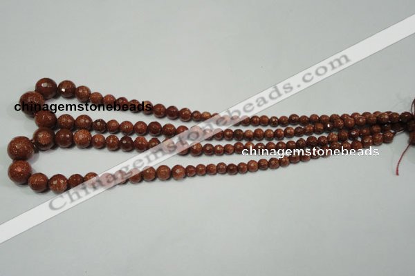 CRO736 15.5 inches 6mm – 14mm faceted round goldstone beads