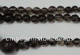 CRO743 15.5 inches 6mm – 14mm faceted round smoky quartz beads