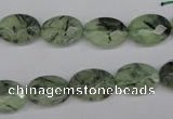 CRU188 15.5 inches 10*14mm faceted oval green rutilated quartz beads