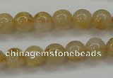 CRU551 15.5 inches 6mm round golden rutilated quartz beads