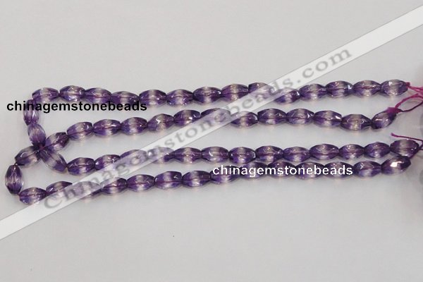 CSA25 15.5 inches 7*12mm faceted rice synthetic amethyst beads