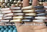 CSB2150 15.5 inches 8*30mm teardrop mixed shell pearl beads