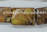 CSE148 18*25mm twisted rectangle dyed natural sea sediment jasper beads