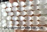 CSE636 15 inches 10*14mm rice selenite beads wholesale