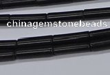 CTB318 15.5 inches 4*13mm tube black stone beads wholesale