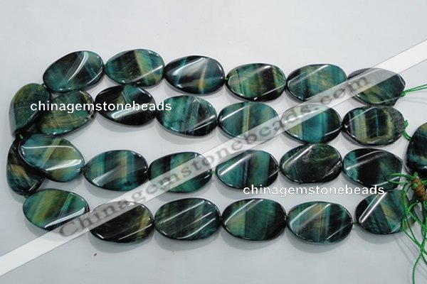 CTE1079 15.5 inches 22*30mm twisted oval dyed green tiger eye beads