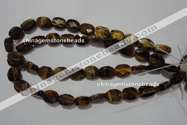 CTE1110 15.5 inches 13*17mm faceted freeform yellow tiger eye beads