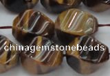 CTE1592 15.5 inches 13*18mm twisted rice yellow tiger eye beads