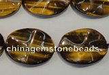 CTE832 15.5 inches 18*25mm wavy oval yellow tiger eye beads