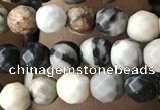 CTG3563 15.5 inches 4mm faceted round black picasso jasper beads