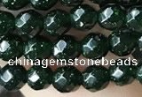 CTG3591 15.5 inches 4mm faceted round green goldstone beads